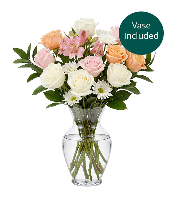 Pastel Buttercup Bouquet in Vase Florist