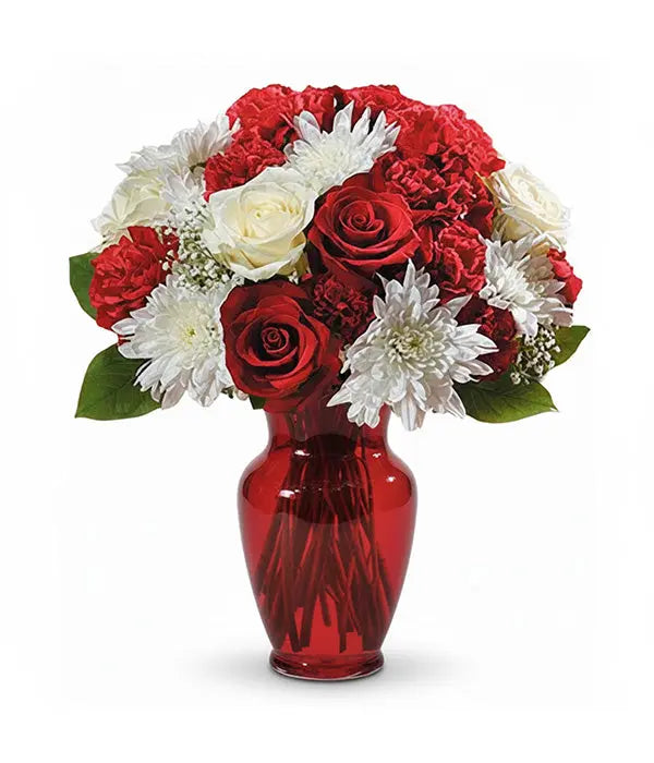 Red roses & white flowers in a red vase