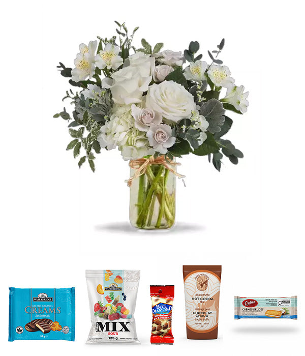 Peaceful Clouds Gourmet gift with white flowers and treats.