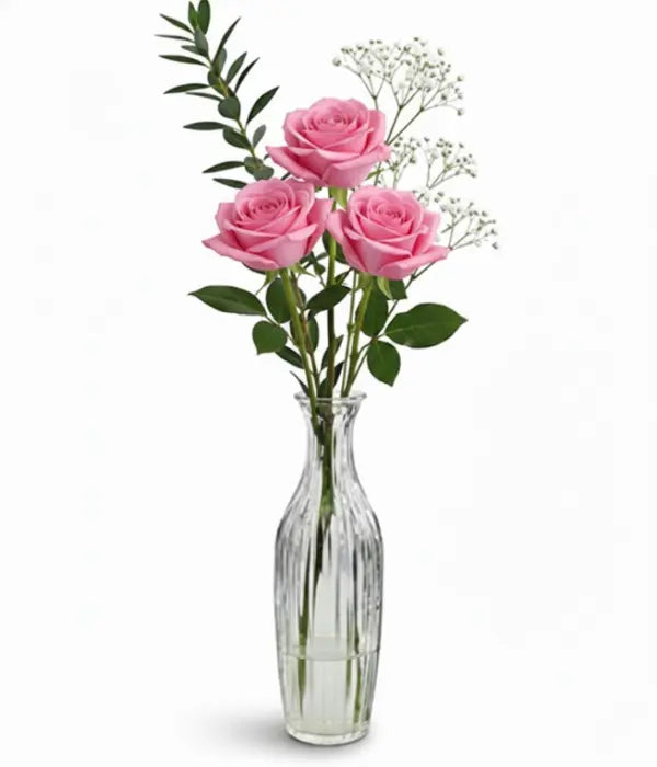 Pink roses in bud vase from florist.