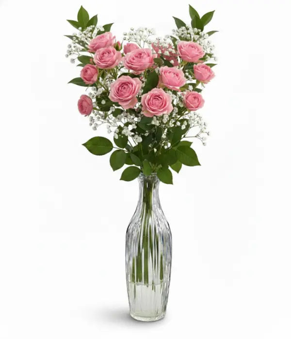 Pink spray roses in bud vase from florist