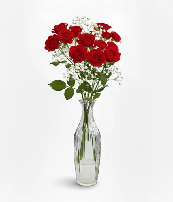 Red spray roses in bud vase from florist