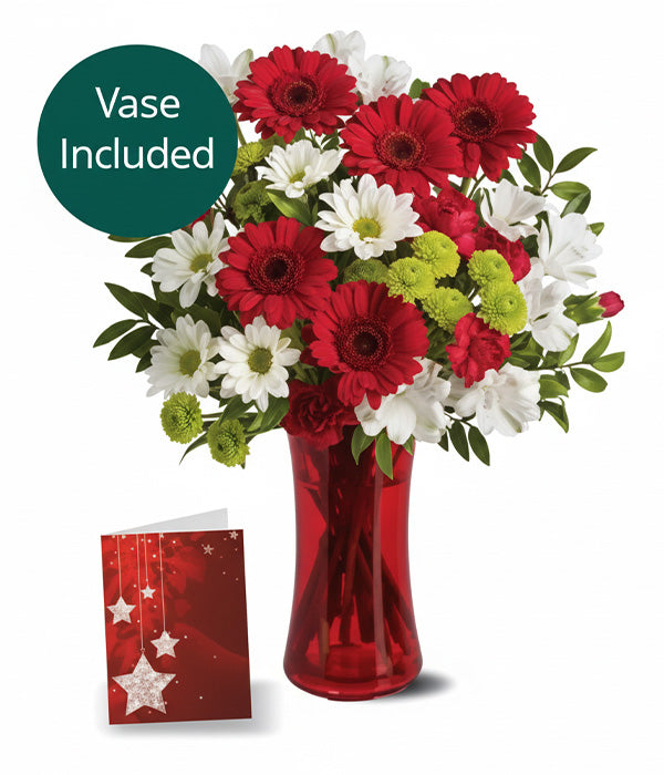 Christmas floral arrangement with red vase