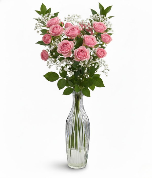 Pink spray roses in bud vase from florist